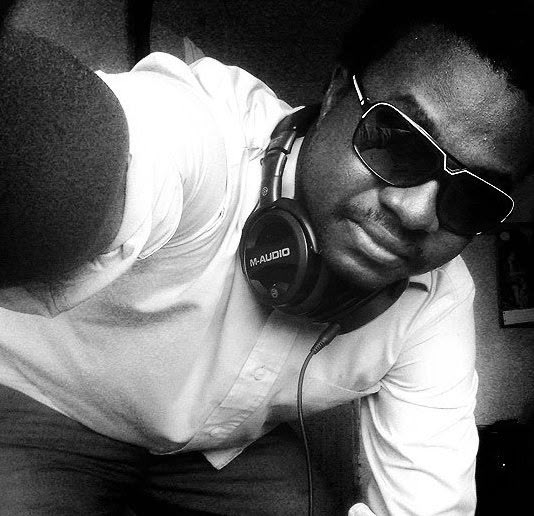 Leslie wearing sunglasses and headphones