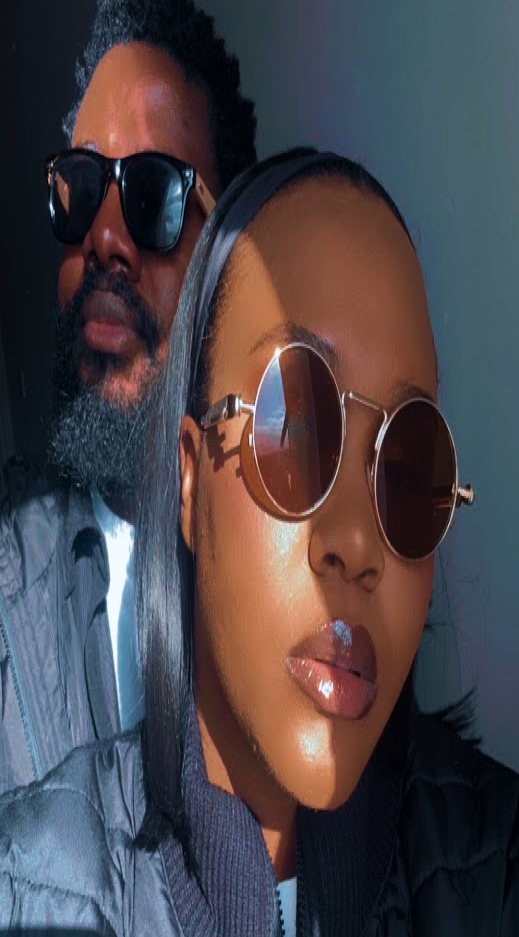 Leslie and his wife wearing sunglasses