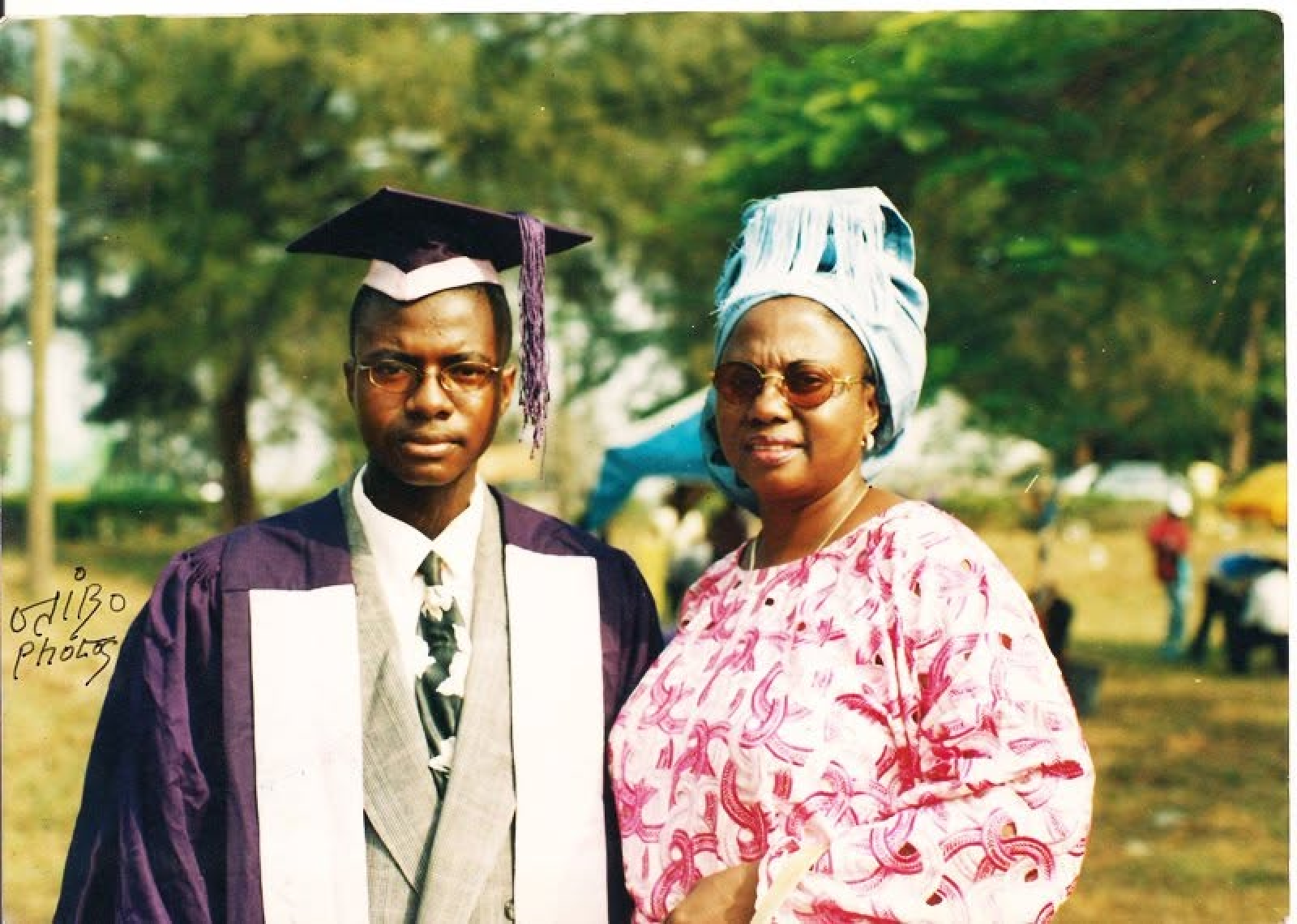 Leslie celebrating graduation with his mother